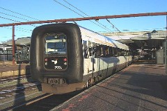 Ic3 trainset MFA 5081/MFB 5281 (named J.C.H. Ellehammer) photographed at the railwaystation Fredericia, 25. December 2005.  The Ic3 was built by ABB Scandia in Denmark. Each unit consists of 3 coaches. Built in a number of 92 trainsets. The trainsets were put in service in 1989 - 1998. 4 diesel engines of 294 kW per trainset. Max speed 180 km/h - 112 mph. Length 58 800 mm. Weight 97 metric tonnes. 16 seats 1st class, 128 seats 2nd class. Up to 5 trainsets can be put together. The MFA 5003/MFB 5203 was put in service in 1993.