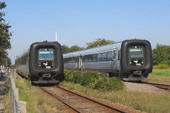 Ic3 trainset MFA 5030/MFB 5230 (named Kong Frederik IX) and MFA 5081/MFB 5281 (named J.C.H. Ellehammer). Photographed in Vildbjerg 13. September 2006.  The Ic3 was built by ABB Scandia in Denmark. Each unit consists of 3 coaches. Built in a number of 92 trainsets. The trainsets were put in service in 1989 - 1998. 4 diesel engines of 294 kW per trainset. Max speed 180 km/h - 112 mph. Length 58 800 mm. Weight 97 metric tonnes. 16 seats 1st class, 128 seats 2nd class. Up to 5 trainsets can be put together. The MFA 5030/MFB 5230 was put in service in 1991 - MFA 5081/MFB 5281 in 1993.