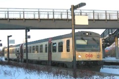 DSB MR 4065/MRD 4265 photographed in Svenstrup by Aalborg 28. January 2006.  The MR class was purchased from 1981 to 1985 in a number of 97. The MR class was purchased from 1978 to 1985 in a number of 98. The first 30 of the MR class were built by Uerdingen in Germany, the rest of the MR class and all of the MRD class were built by Scandia in Denmark. Dieselhydraulic Deutz engine. 325 hp. Max speed 120 km/h - 75 mph. Length each unit 22 335 mm. Weight 34,5 metric tonnes. One trainset consists of two units. Renovated in 1995 - 1997. Increased max. speed to 130 km/h - 81 mph. MR 4065 was put in service in 1984 - MRD 4265 was put in service in 1983.